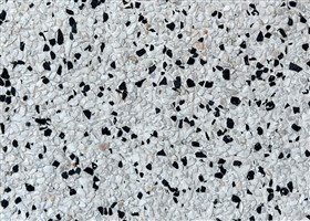 White Pebblewash flooring with mini marble aggregates and soft dusk accents, ideal for modern exterior surfaces.