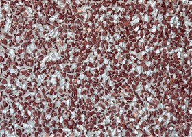 Grey Pebblewash with scarlet marble mini aggregates for a bold and artistic exterior design.