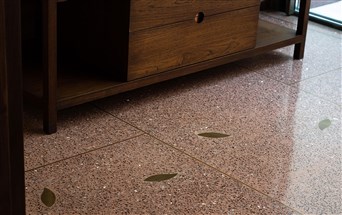 Terrazzo polished floor with stone inlays