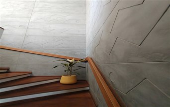 grey patterned microcement wall 